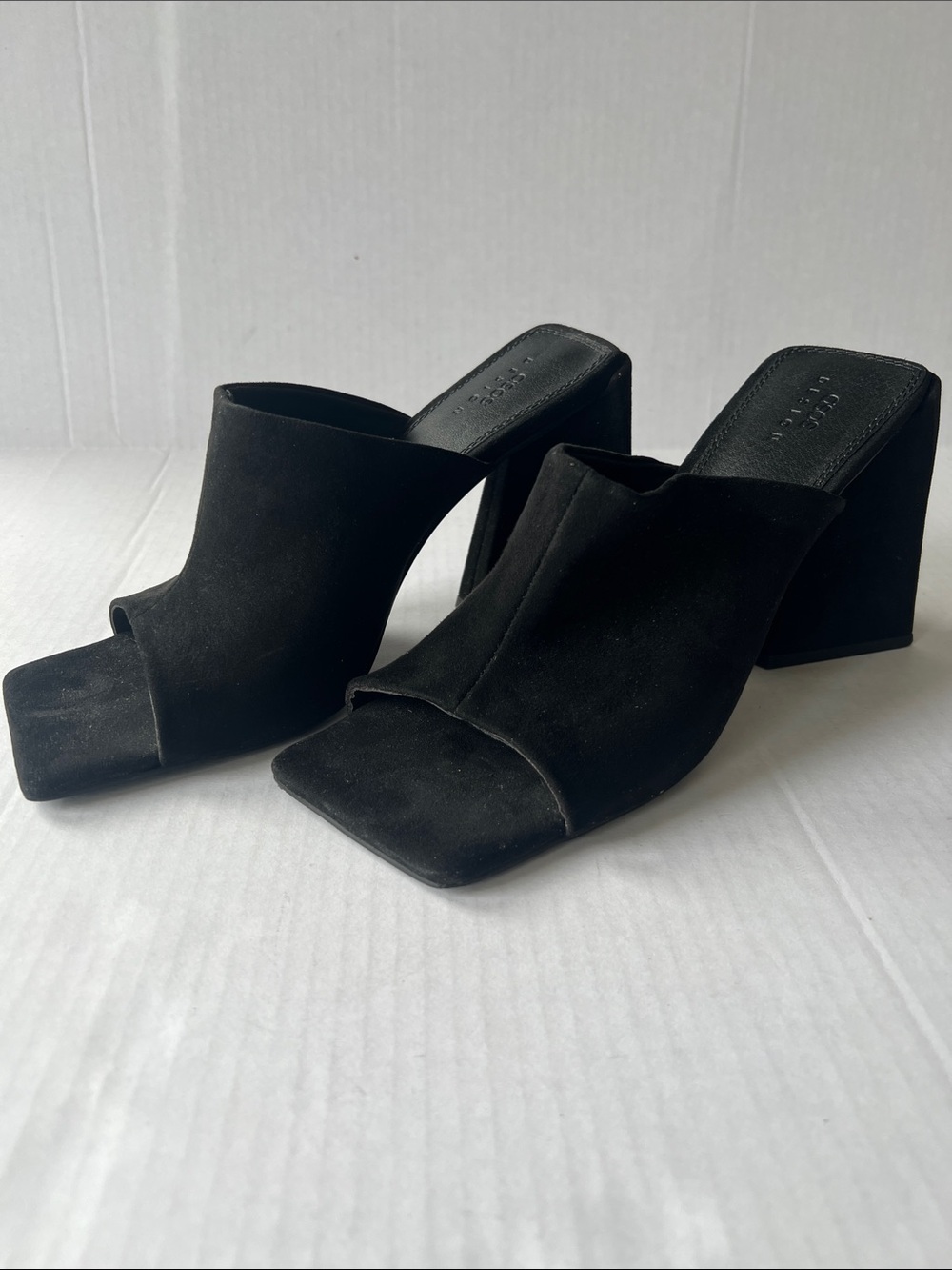 ASOS Design black suede heeled mules chunky block heel and a square toe design.